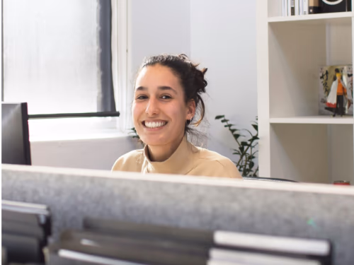 A smiling apprentice in a company